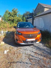 Peugeot E-2008 orange fusion toit noir a vendre.