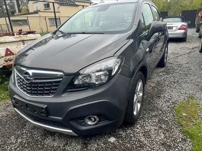 Opel mokka 1.6 benzine bj 2015 km 121.459 rondom krassen
