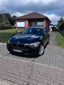 Bmw 116i // 130.000km. Groot Navi. Airco. 12m GARANTIE