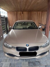 Champagne-kleurige BMW 318d break 2014