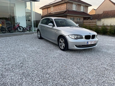 BMW 118d euro 5 / 5 deurs / airco / open dak / parkeersensor