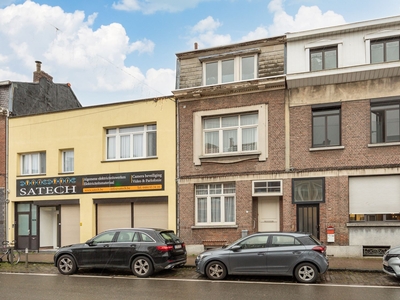 Te renoveren woning met 6 slaapkamers en koer te Deurne!