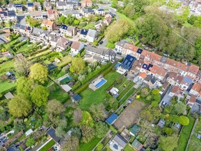 Halfopen bebouwing met uiterst ruime tuin (1593 m²) te koop