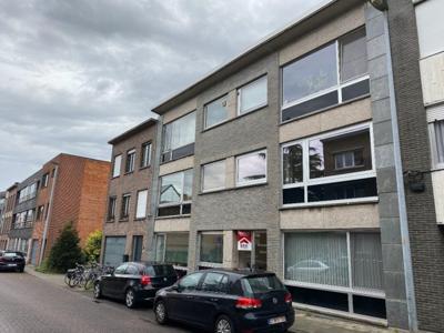 Gelijkvloers 1-slaapkamerappartement met ruime tuin