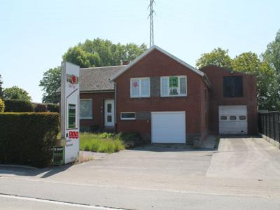 Magazijn (171m²) met woning, garage en tuin op 1.060m²