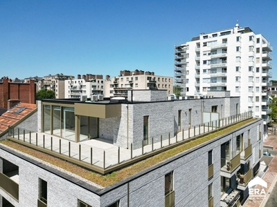 Penthouse met zeer ruim terras op centrale locatie in Genk