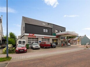 Huis met garage en duplex woonst