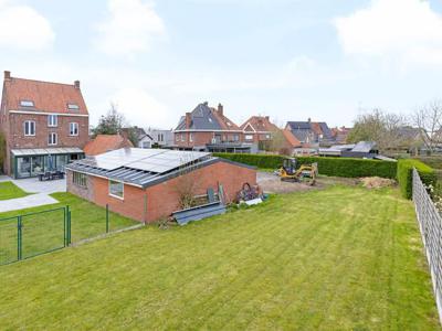 Woning met magazijn op een perceel van circa 1550m²