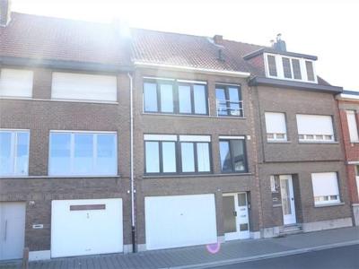 Appartement met 2 slaapkamers, garage en tuintje