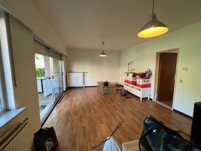 Gelijkvloers 1 slaapkamer Appartement met garage en tuin