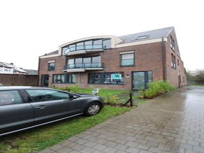 Gelijkvloers 3-slpk appartement met tuin en staanplaats