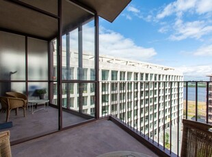 Lichtrijke studio met terras dicht van de Schelde