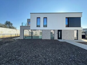 Nieuwbouw met 2 slaapkamers en tuin (incl. parking & kelder)