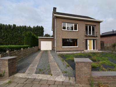 Gezinswoning met 3 slpk's, garage en tuintje