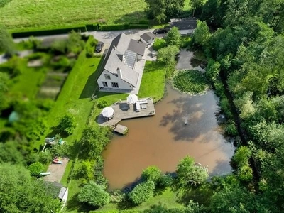 Unieke landelijke villa met prachtige tuin te BAAL