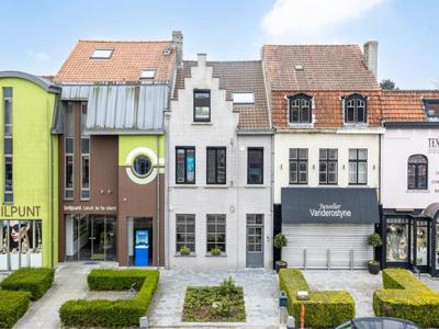 HUIS met HANDELSRUIMTE en LOODS