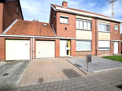 Ruime woning met 3 slaapkamers, garage en tuin