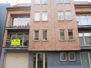 Appartement met 2 slaapkamers , terras en garage