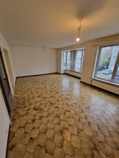 Ruim en licht appartement met terras in het hart van dilbeek