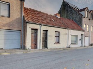 Te renoveren woning/ bouwgrond in het centrum van De Klinge