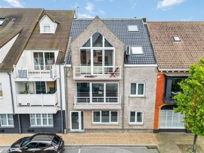 Tweeslaapkamer appartement op gelijkvloer met ruime garage