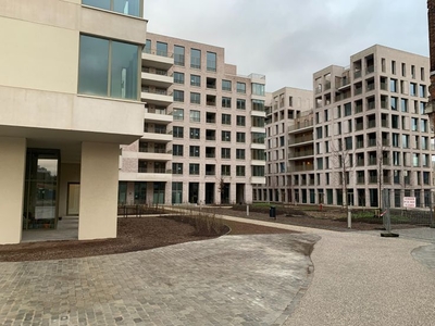 Prachtig nieuwbouwappartement met zonnig terras en autost...