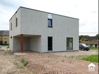 BEN woning met carport en tuin in Melveren, Sint-Truiden.