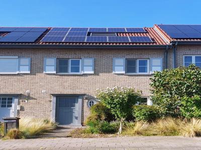 Energiezuinige woning met 4 slaapkamers, tuin en garage.