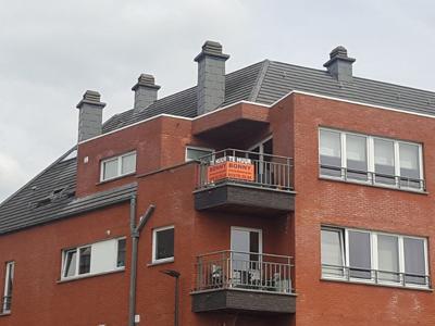 Duplex hoekappartement met terras en garagebox aan station