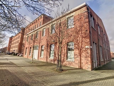 Lot: ruime duplex met 2 slaapkamers en staanplaats