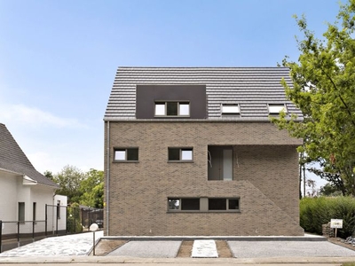 Modern duplex appartement met 2 slpks en carport !