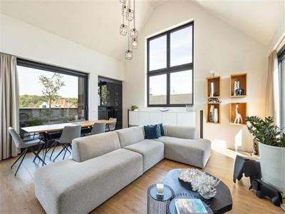 Exclusieve penthouse met open leefruimte en 3 terrassen.