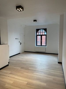 Gerenoveerd twee-slaapkamerappartement te huur nabij centrum Gent