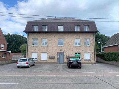 Ruim gelijkvloersappartement met 2 slaapkamers en garage.