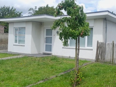 Lichtrijke energiezuinige Bungalow met tuin en 2 garages