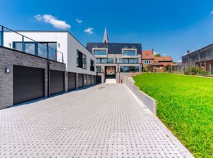 Passieve appartementen met terrassen en garages te Strijpen.