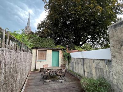 Rijwoning met tuin en 3 slaapkamers in Kortrijk te koop!