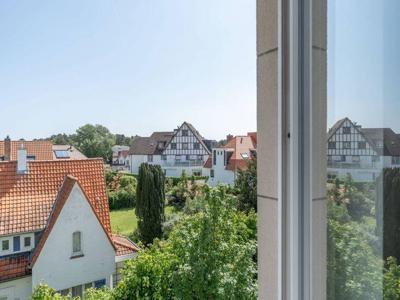 Gerenoveerd appartement met zicht over de villa's in het cen