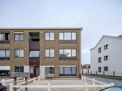 Lichtrijk tweeslaapkamer appartement met garagebox