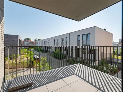 Nieuwbouwappartement met 2 terrassen en garage