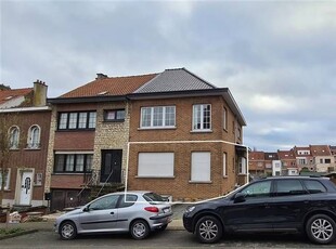 1 kamer gelijkvloers appartement met tuin.