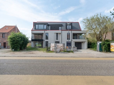 Nieuwbouw dakappartement met 2 slpks en autostplts te Mol.