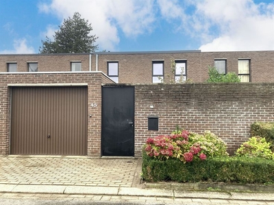 Gezinswoning met 3 slaapkamers, garage en tuin