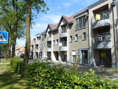 Gelijkvloers nieuwbouwappartement met 2 slpks en autostaanpl