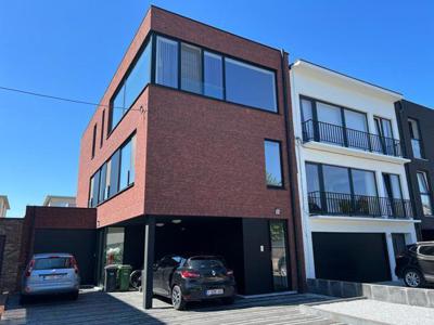 Nieuwbouwappartement met 2 slaapkamers, tuin en garage