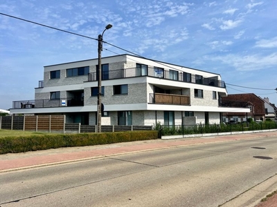 Nieuwbouwappartement met ruim terras en parking