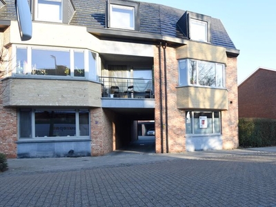 1-slaapkamerappartement met tuintje en staanplaats.