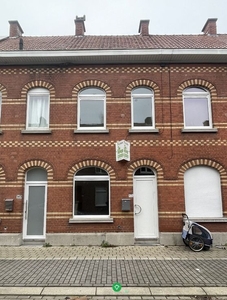 Centraal gelegen rijwoning met 2 slaapkamers en diepe tuin