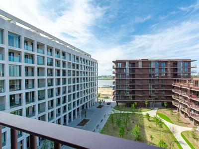 Lichtrijke studio met terras dicht van de Schelde