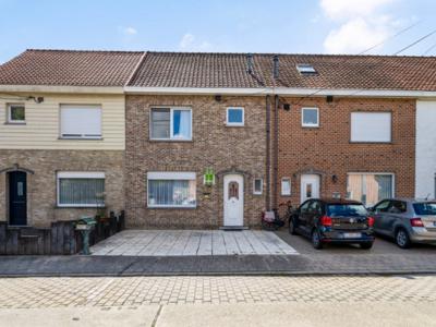 Tussenwoning met zongerichte tuin en drie slaapkamers